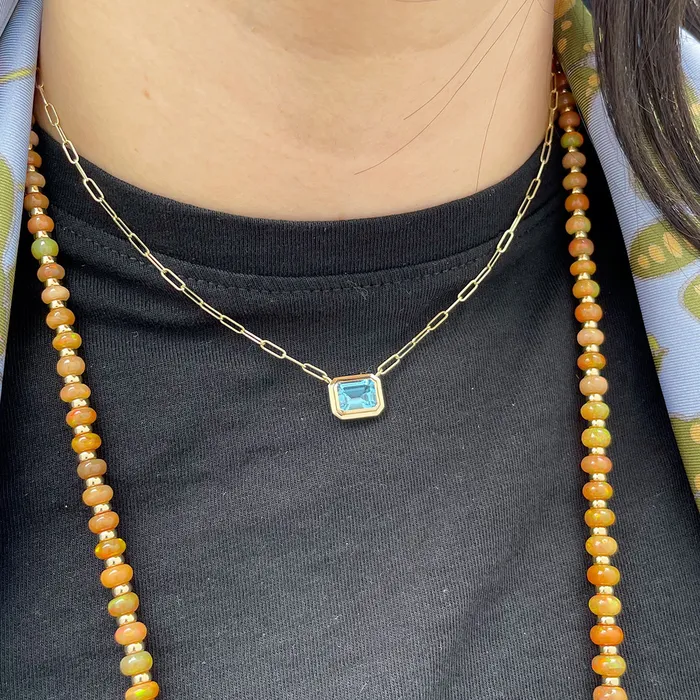 Goshwara Necklaces Goshwara EmeraldCut Blue Topaz 18K Gold Pendant Necklace