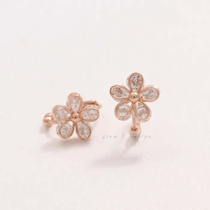 from J Shop CZ Daisy Huggie Earrings Earrings
