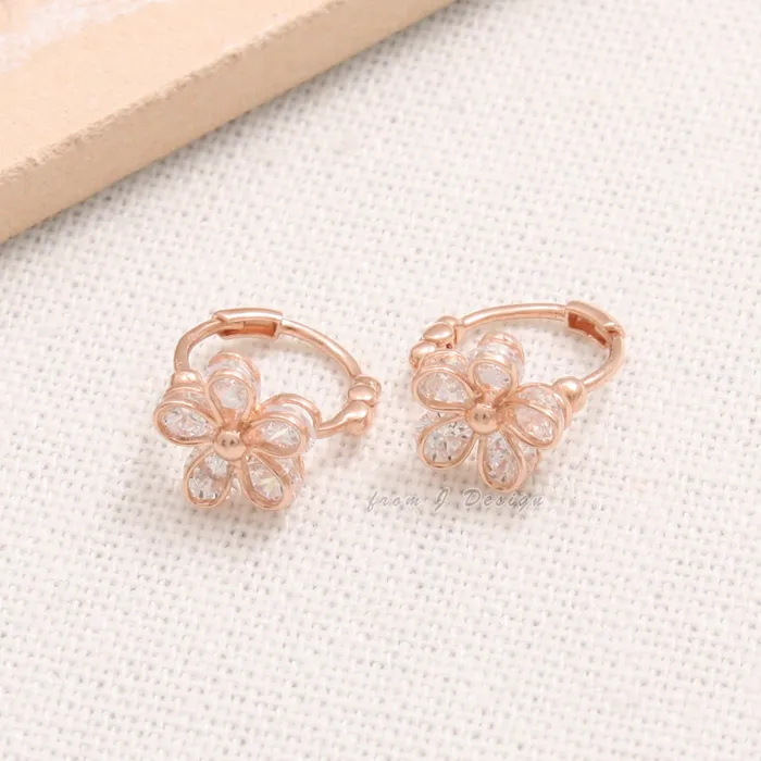 from J Shop CZ Daisy Huggie Earrings Earrings