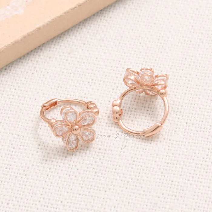 from J Shop CZ Daisy Huggie Earrings Earrings