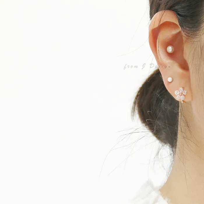 from J Shop CZ Daisy Huggie Earrings Earrings