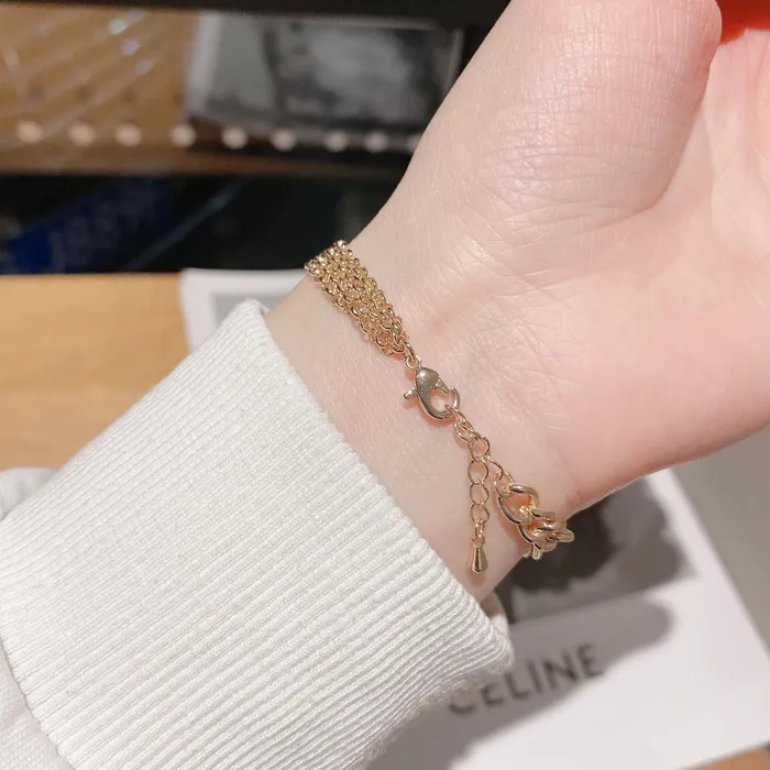 Bracelets Refined by AnnaKaci Asymmetrical Gold Chain Bracelet with Coin Bracelets Refined by AnnaKaci Asymmetrical Gold Chain Bracelet with Coin