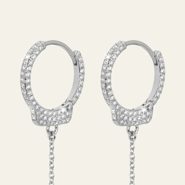 Hand crafted in 18k white gold and set with 132 highquality round brilliant cut diamonds Earrings Love Lockdown Diamond Earrings