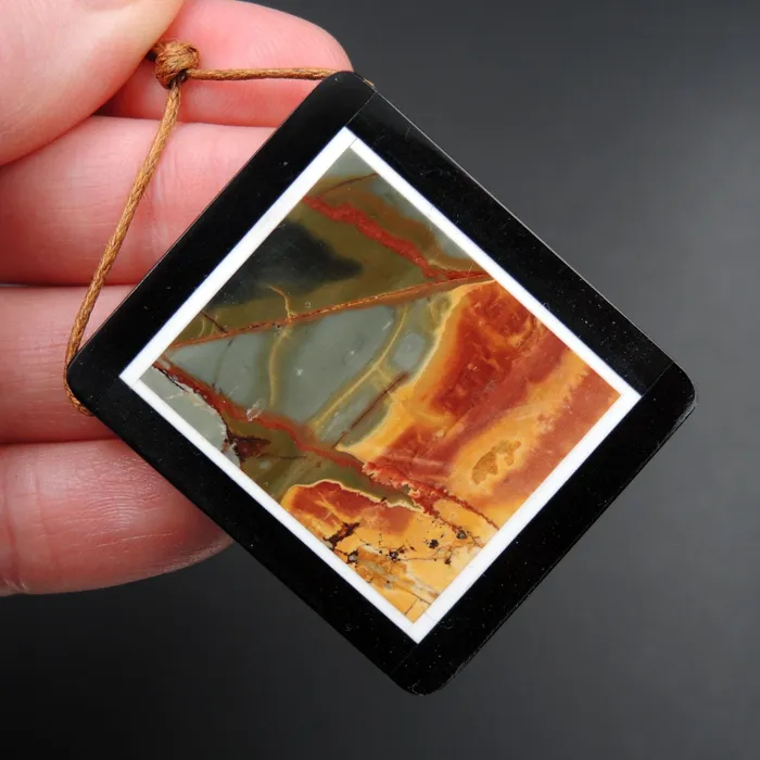 Intrinsic Trading Necklaces Intarsia Pendant Natural Red Creek Jasper W Black Onyx Inlay Side Drilled Rectangle Pendant Multi Color Picasso Jasper Picture Frame P1638